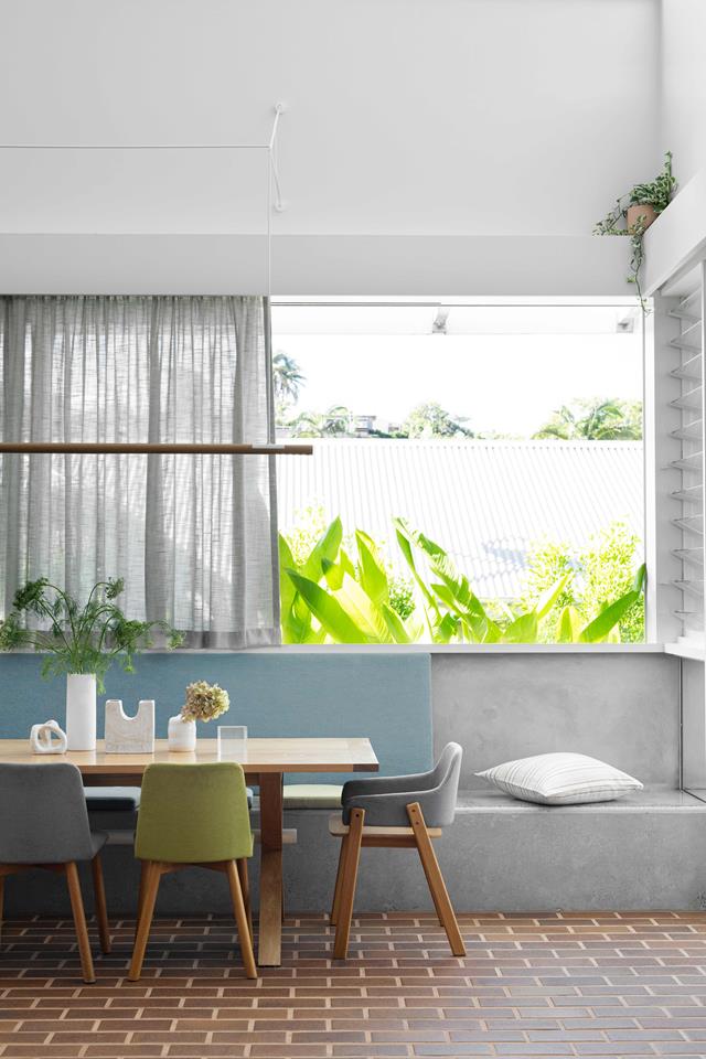 Concrete dining table in custom home in Paddington, Brisbane