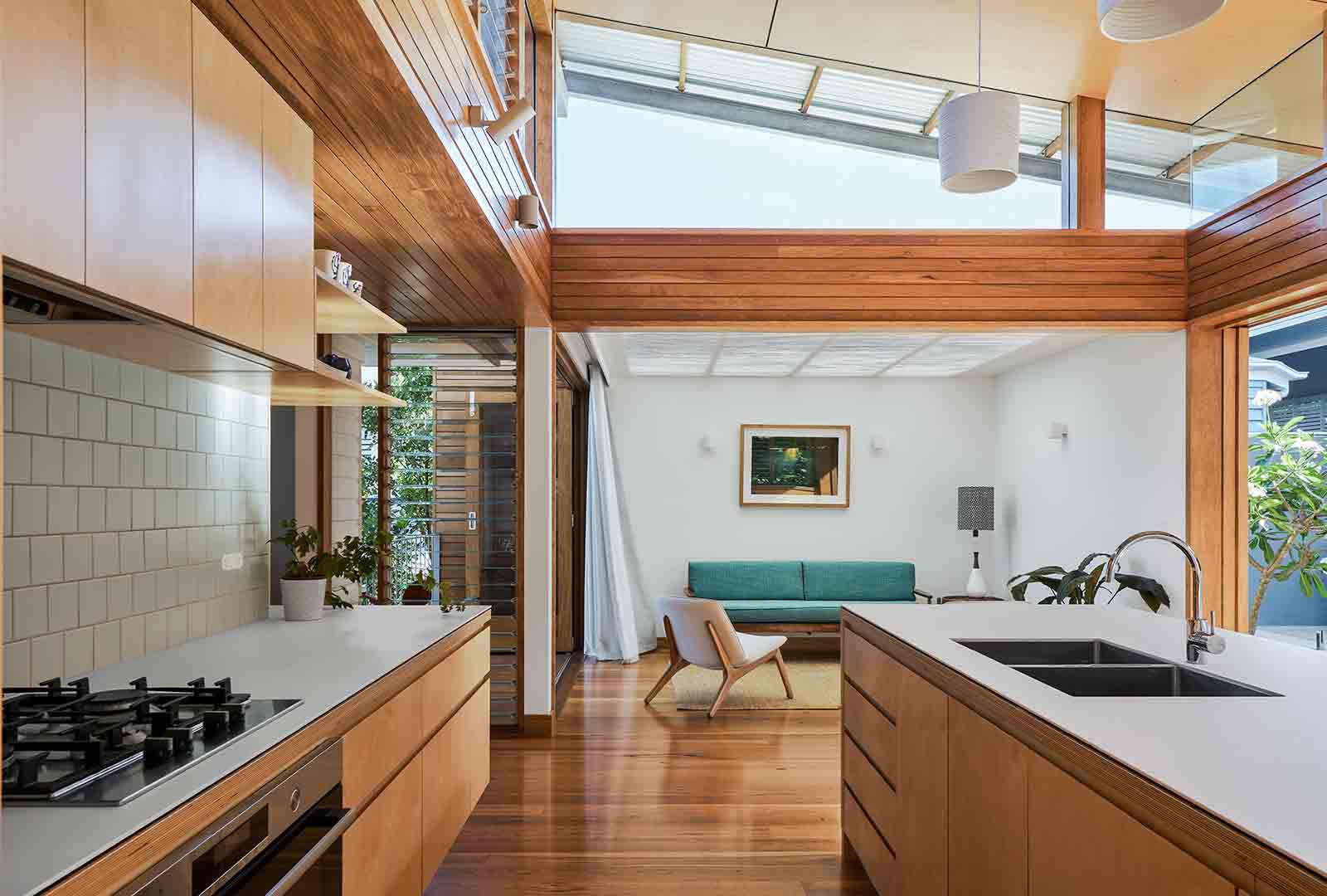 Kitchen and living of a custom home in Brisbane built by Bluebird